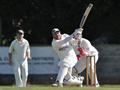 Ryan launches the ball high into the leg side.jpg